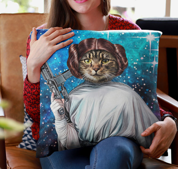A woman holds the Custom Star Wars Princess Leia Pet Cushion, featuring a cat as Princess Leia with buns and a blaster on a starry blue background—an ideal gift for pet lovers.