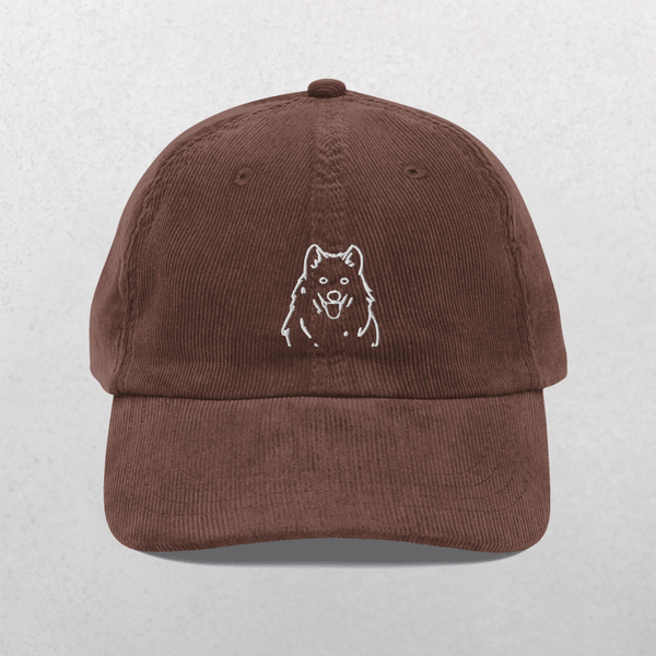 The brown Custom Pet Line Art Portrait Corduroy Cap features an embroidered white outline of a fluffy dog—perfect as a personalized gift for any dog lover.