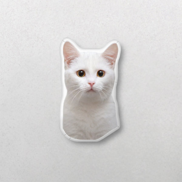 A custom shape pet pillow featuring a white cat with yellow eyes and pink ears on a light background—perfect as a cozy keepsake or gift for any pet lover.