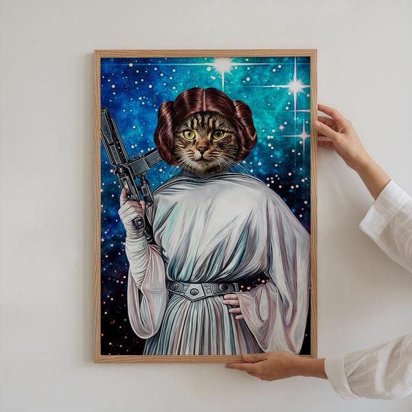 A person hangs the Star Wars Princess Leia framed custom pet portrait, featuring a cat dressed as Princess Leia with a blaster and space background—an ideal gift for pet lovers.