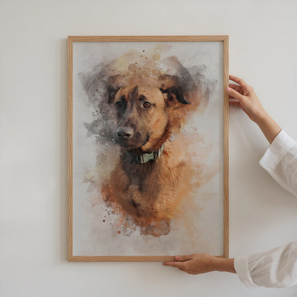 A person in a white shirt hangs a Watercolor Pet Portrait—a custom canvas featuring a brown dog with dark ears and a green collar—on a white wall, adding unique personalized dog art to their space.