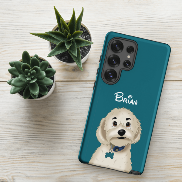 A Custom Pet Samsung Case – Disney, featuring an illustration of a white fluffy dog named Brian, sits on a light wooden surface beside two small potted succulents.