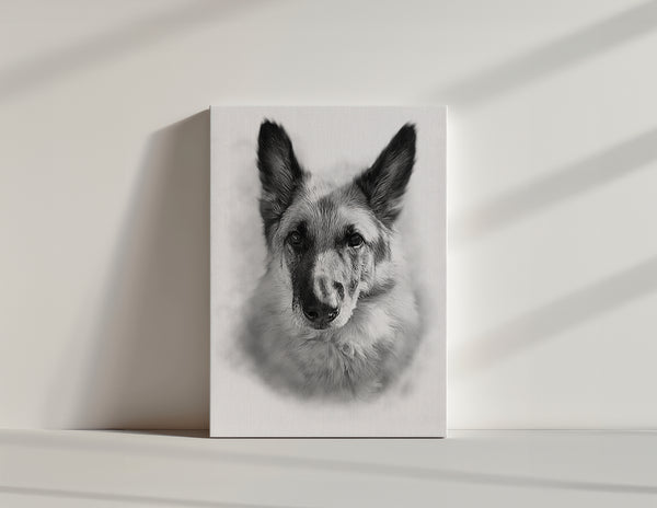The Pencil Sketch Art is a black and white custom pet portrait of a dog with upright ears, printed on canvas and displayed leaning against a light-colored wall with shadows cast in the background.