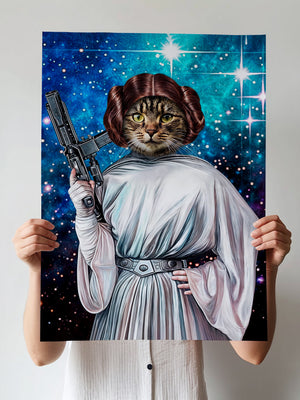 A person holds a Star Wars Princess Leia poster with a cat dressed in Leia’s iconic white dress, hair buns, and blaster against a space background—an ideal pet lover gift or unique artwork for sci-fi fans.