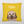 The Custom Cartoon Pet Cushion is yellow with an illustrated brown dog with floppy ears and “Max” in white above its head. Its plain, light background makes it a cozy keepsake for any dog lover.