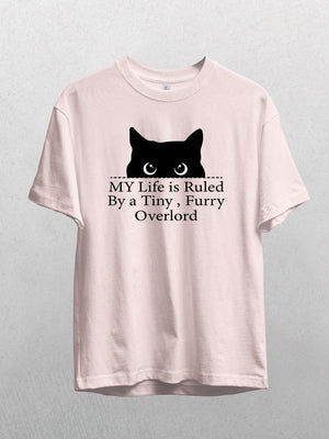 A pink vintage pet t-shirt, “Tiny Furry Overlord,” features a black cat head silhouette and the phrase: MY Life is Ruled By a Tiny, Furry Overlord. A funny, unique keepsake for cat lovers.