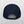 The Embroidered Pet Portrait Organic Classic Dad Cap in navy blue is shown from the back, highlighting its adjustable strap with brass buckle against a plain light background.