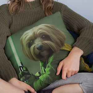 A person in a green sweater holds a Custom Star Wars Pet Cushion, showcasing an illustration of a dog as a Jedi with a green lightsaber.