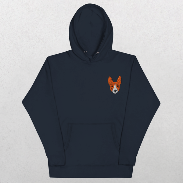 The Embroidered Custom Pet Hoodie in navy features a small, embroidered brown and white corgi face on the left chest, plus a front pocket and drawstring hood for comfort.
