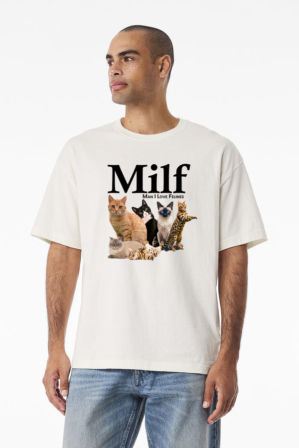 A man poses against a plain white background in the Milf tee—a white shirt with several cats and bold text (Man I Love Felines)—the perfect vintage pet t-shirt and ideal gift for cat lovers.