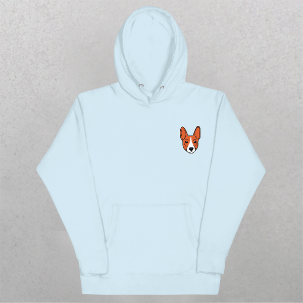 The Embroidered Custom Pet Hoodie in light blue features a small corgi face illustration on the left chest and is shown on a plain light gray background—making it an ideal gift for pet lovers.