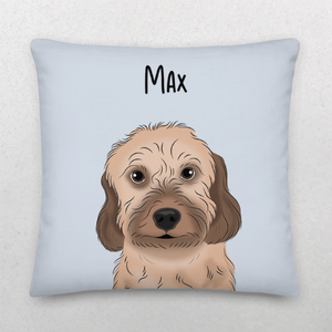 A cozy Custom Cartoon Pet Cushion in light blue, featuring a brown, fluffy dog with big eyes and floppy ears, personalized with the name Max in bold black letters above the illustration—perfect for any dog lover.