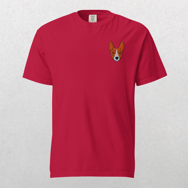 The Embroidered Pet Portrait Organic T-Shirt in red showcases a small corgi face embroidery on the upper left chest, making it a unique keepsake and perfect gift for pet lovers.