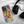 The Custom Pet iPhone Case – Abstract Art, featuring a painted dog design, rests beside black headphones on soft white fabric—a vibrant and personalized gift for pet lovers.