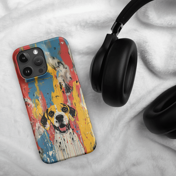 The Custom Pet iPhone Case – Abstract Art, featuring a painted dog design, rests beside black headphones on soft white fabric—a vibrant and personalized gift for pet lovers.