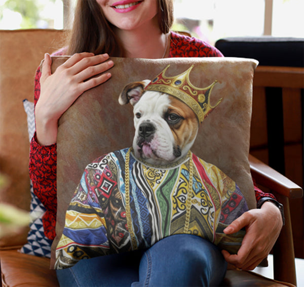 A smiling woman holds the Custom Notorious D.O.G Pet Cushion, featuring a bulldog in a vibrant royal outfit and gold crown—a cozy keepsake that adds charm and personality to any space.