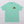 The Embroidered Pet Portrait Organic T-Shirt features a light green color and a small embroidered dog face with floppy brown ears on the left chest, making it a unique keepsake for animal lovers.