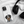 A Custom Pet iPhone Case – Modern Vector Art featuring an illustrated dog and the name TEDDY sits beside black headphones on a soft white blanket—an ideal gift for pet lovers.