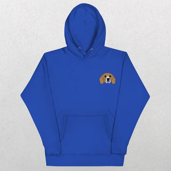 The Embroidered Custom Pet Hoodie in royal blue features a small cartoon beagle dog face embroidered on the left chest—a cozy keepsake for dog lovers, displayed on a plain light background.