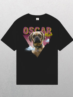 The Personalised Retro Tee | Pink is a black pet t-shirt with a large brown dog in a collar on a geometric pink and purple background. OSCAR Ozzie appears above the dog in bold yellow and pink stylized text.