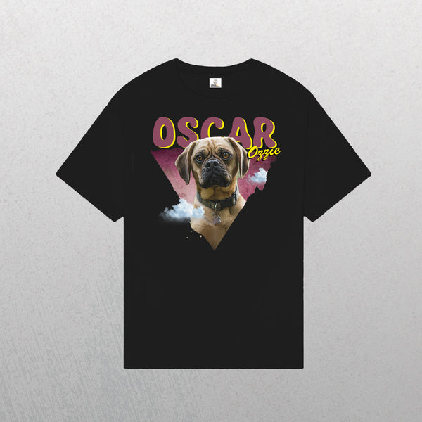 The Personalised Retro Tee | Pink is a black pet t-shirt with a large brown dog in a collar on a geometric pink and purple background. OSCAR Ozzie appears above the dog in bold yellow and pink stylized text.