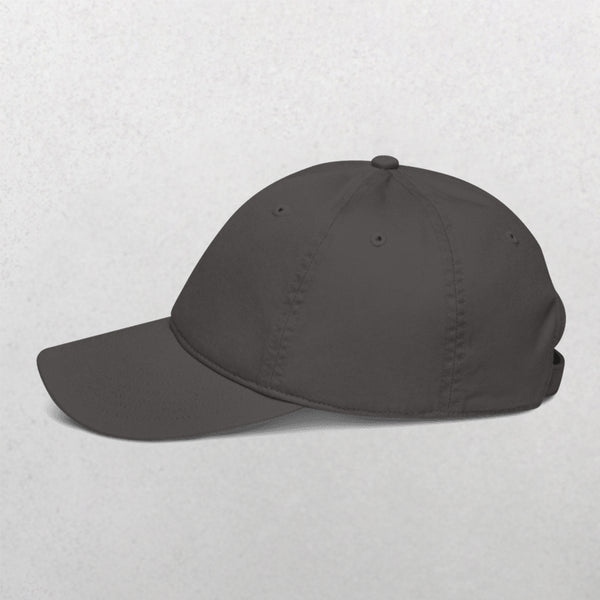 The Embroidered Line Art Pet Portrait Organic Classic Dad Cap in plain dark gray is shown from a side profile on a light gray background, highlighting its visible stitching and curved brim.