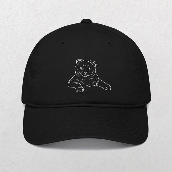 The Embroidered Line Art Pet Portrait Organic Classic Dad Cap is a black hat with a minimalist white cat design, making it a stylish and personalized gift for any cat lover.