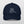 The Embroidered Line art Pet Portrait Organic Classic Dad Cap is a dark navy blue hat featuring a white outline of a folded-ear cat with an extended paw—an ideal personalized pet gift for any cat lover.