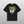 Personalised Retro Tee | Green: Black t-shirt with a grumpy cat before a green triangle, DAISY in bold yellow, and Harford above the cat—a unique vintage pet lover gift.