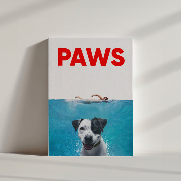 The Paws Film Cover is a canvas print parodying the Jaws poster, showing a happy dog underwater beneath a swimmer. PAWS appears in bold red, creating a unique custom pet portrait—an ideal gift for pet lovers.