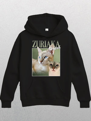Black Personalised Homage Hoodie | Jungle featuring a graphic of two blue-eyed cats (one large, one small) and ZURIAKA with Hutch above them on a light gradient background. Made from premium fleece.