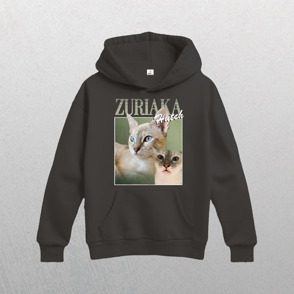 The Personalised Homage Hoodie | Jungle in gray features two cats—one with blue eyes, one with green—and “ZURIAKA” and “Hutch” above. This unique vintage-inspired hoodie is a perfect gift for any pet lover.