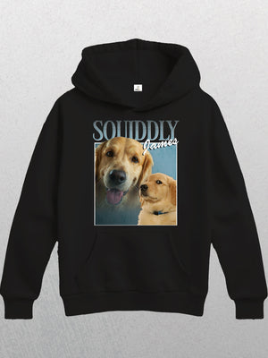 The black Personalised Homage Hoodie | Ice showcases two golden retriever images—one happy close-up on the left, side profile on the right—with SOUNDLY James above them, set against a gray background and crafted from premium fleece.