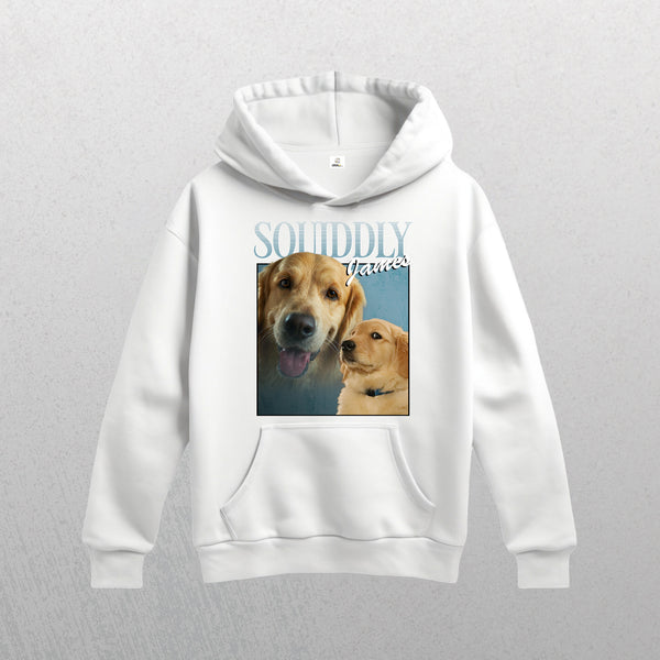The white Personalised Homage Hoodie | Ice features two golden retriever photos—one close-up, one profile—with bold SUDDDLY and famous script above. A cozy keepsake for fans of custom pet hoodie styles!.