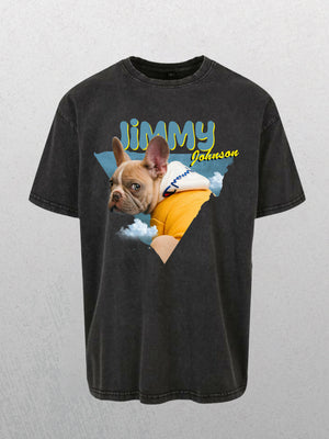 A grey personalized retro tee featuring a blue shirt-wearing French Bulldog among clouds, with Jimmy in bold yellow and Johnson in script—ideal as a custom pet shirt or unique gift for pet lovers. Product Name: Personalised Retro Tee | Blue.