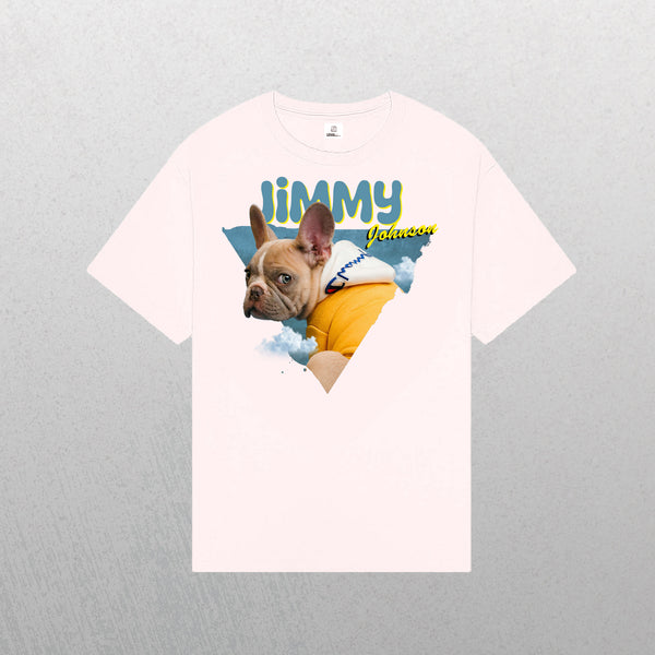 A light pink Personalised Retro Tee | Blue showcases a French Bulldog in a yellow hoodie with cloud accents. Bold, colorful LiMMY Johnson text appears above and beside the dog—a one-of-a-kind personalized pet keepsake.