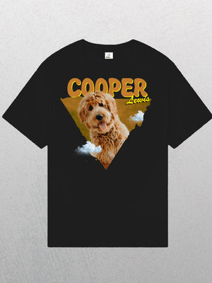 The Personalised Retro Tee | Orange is a black t-shirt featuring a photo of a brown, curly-haired dog with clouds, COOPER in bold yellow and Lewis in script—an ideal custom shirt for any pet lover.