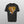 A grey Personalised Retro Tee | Orange featuring a graphic of a brown, fluffy dog with COOPER Lewis in large yellow letters above, set against a triangular yellow background with small clouds—perfect for pet lovers.