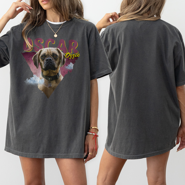 A woman wears a pink Personalised Retro Tee with a custom dog image, Oscar in bold, and Ozzie in yellow script. The back is plain—an ideal pet keepsake and perfect gift for pet lovers.