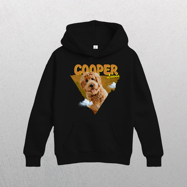 Black Personalised Retro Hoodie | Orange with a curly-haired dog graphic, bold yellow COOPER above, and cloud accents. This black hoodie features a subtle textured background—an ideal personalized pet gift for any dog lover.