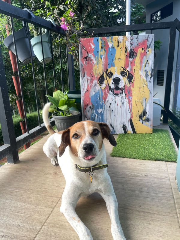 A white and brown dog with a yellow collar lies on a balcony floor in front of the Abstract Masterpiece - Custom Pet Portrait. Potted plants and greenery can be seen in the background.