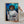 A person hangs the Star Wars Princess Leia framed custom pet portrait, featuring a cat dressed as Princess Leia with a blaster and space background—an ideal gift for pet lovers.