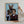 A person holds the Step Brothers custom pet portrait featuring a dog with a human body and a teenage boy in argyle sweaters, styled as a classic family photo—perfect pet artwork and the ideal gift for pet lovers.