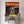 A person holds a Pup Fiction Pet Portrait—a parody movie poster featuring Peanut the golden retriever with a stick, styled after a famous film poster. It’s the perfect quirky pet lover gift or unique pet artwork for your home.