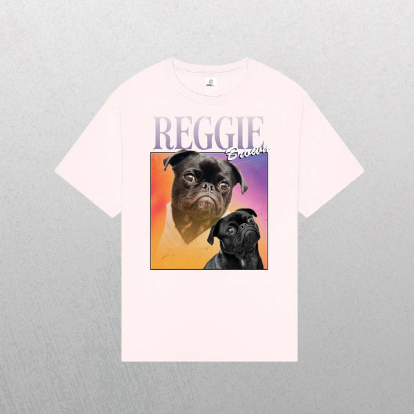 The Personalised Homage Tee | Cosmic in light pink features two photos of a black pug—one color, one black & white—with REGGIE and Smooch above on a pastel gradient. This vintage-inspired pet shirt is perfect for dog lovers.