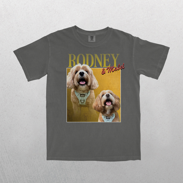 The Personalised Homage Tee | Gold in gray features two happy light-brown dogs in harnesses, with RODNEY in bold yellow and & Mitchel in red script—an ideal keepsake or thoughtful gift for any pet lover.