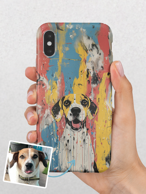 A hand holds an iPhone with the Custom Pet iPhone Case – Abstract Art, featuring a vibrant painted dog inspired by the real pet in an inset photo. The design pops with bold blue, yellow, red, and black brush strokes.