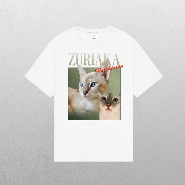 White Personalised Homage Tee | Jungle in white, featuring two light-colored blue-eyed cats—one larger, looking aside, and one smaller. Vintage pet t-shirt design with “ZURIAKA Hutchinson” in large cursive at the top.