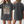 A woman wears the Personalised Homage Tee | Jungle, an oversized black T-shirt with a cat and lounging sloth graphic, “ZURIAKA” and “Empress” text above the image. This vintage pet tee is shown from both front and back angles.