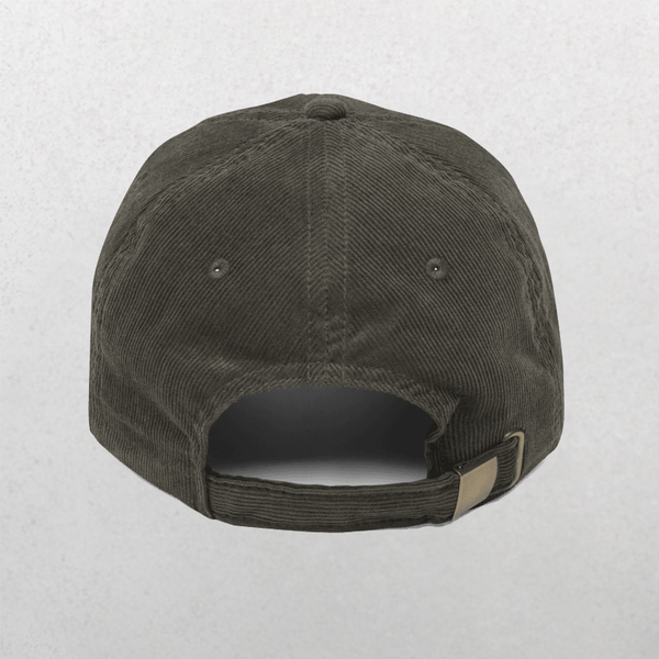 A dark-colored Chord Vintage Cap - Furr Mama is shown from the back, featuring an adjustable strap with a metal buckle and two small ventilation eyelets against a plain light gray background.